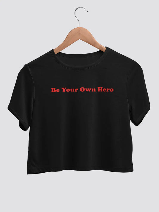 Black cotton crop top with text "Be your own hero "