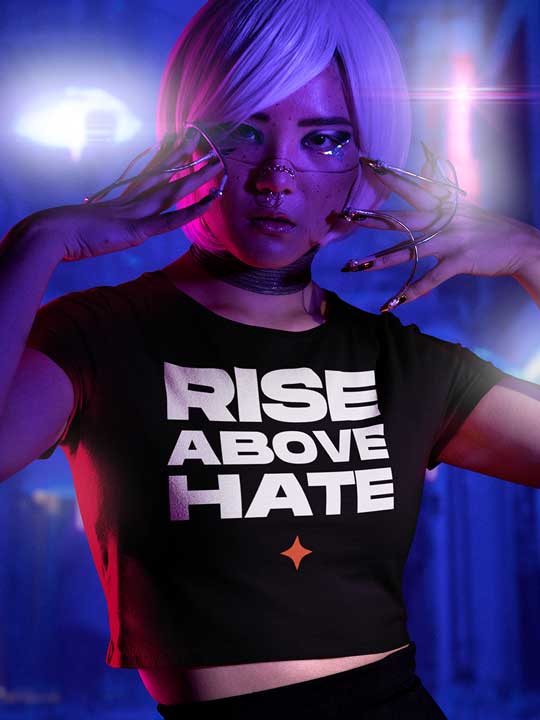 Asian woman wearing 'RISE ABOVE HATE' Black crop top in a cyberpunk setting