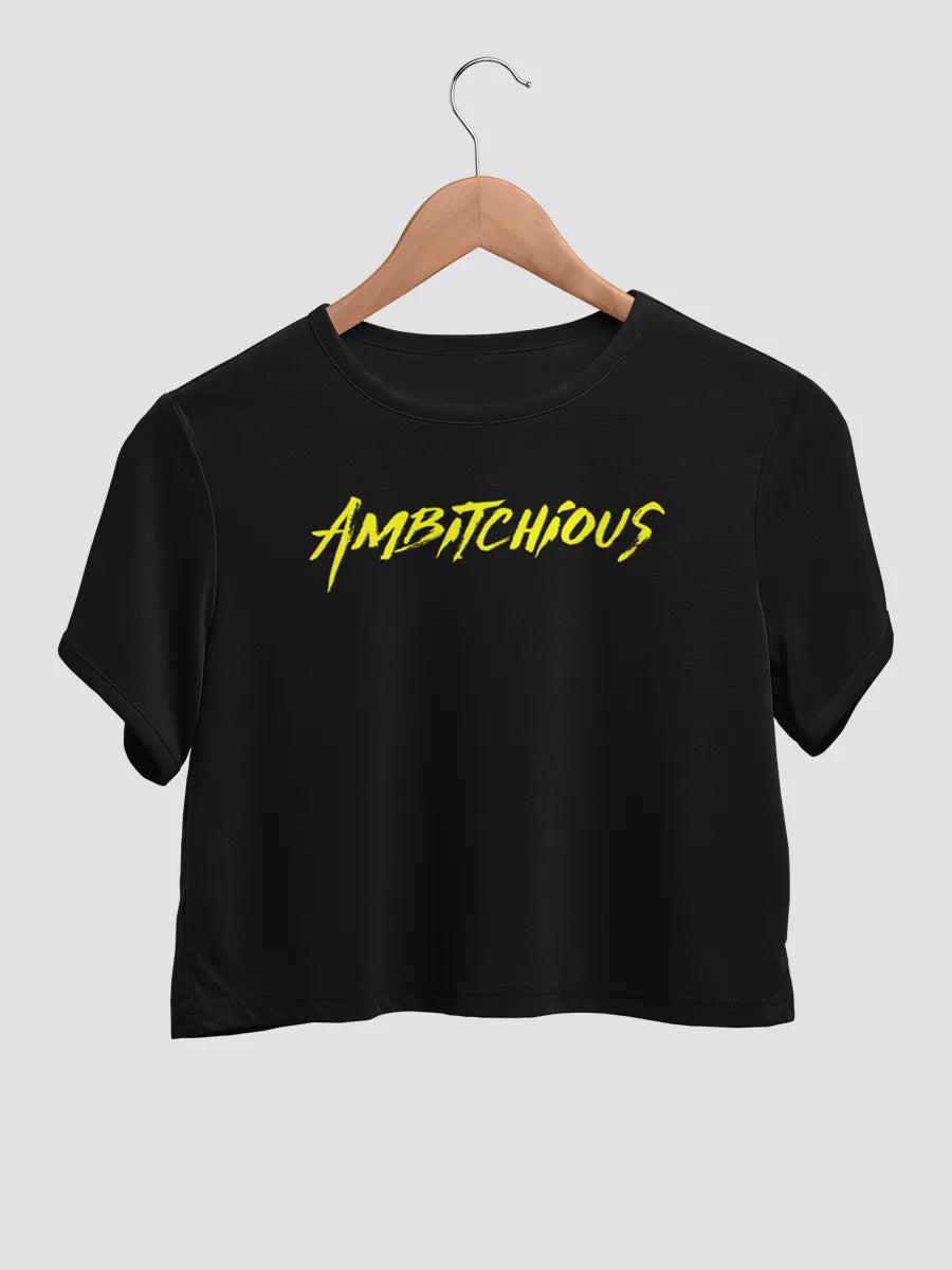 Black cotton crop top with text "Ambitchious " in yellow