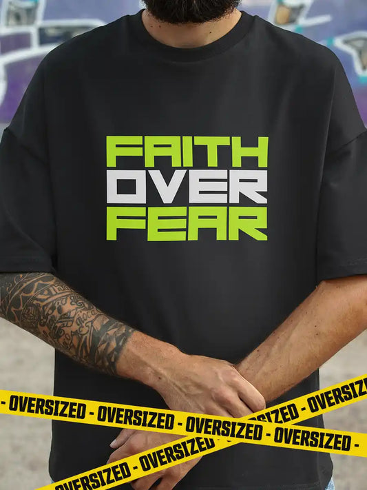 Man wearing Black Oversized Cotton Tshirt with quote "Faith over Fear "