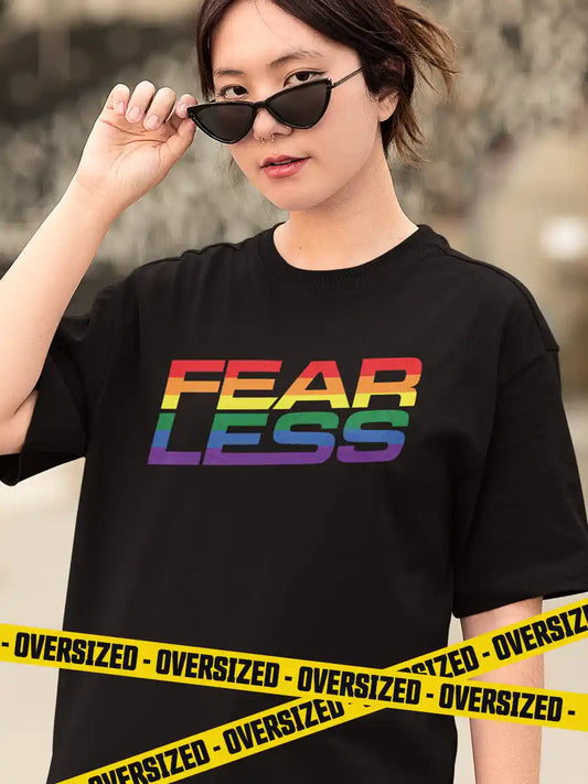 Woman wearing Black Oversized Cotton Tshirt with quote "Fearless" in PRIDE colors