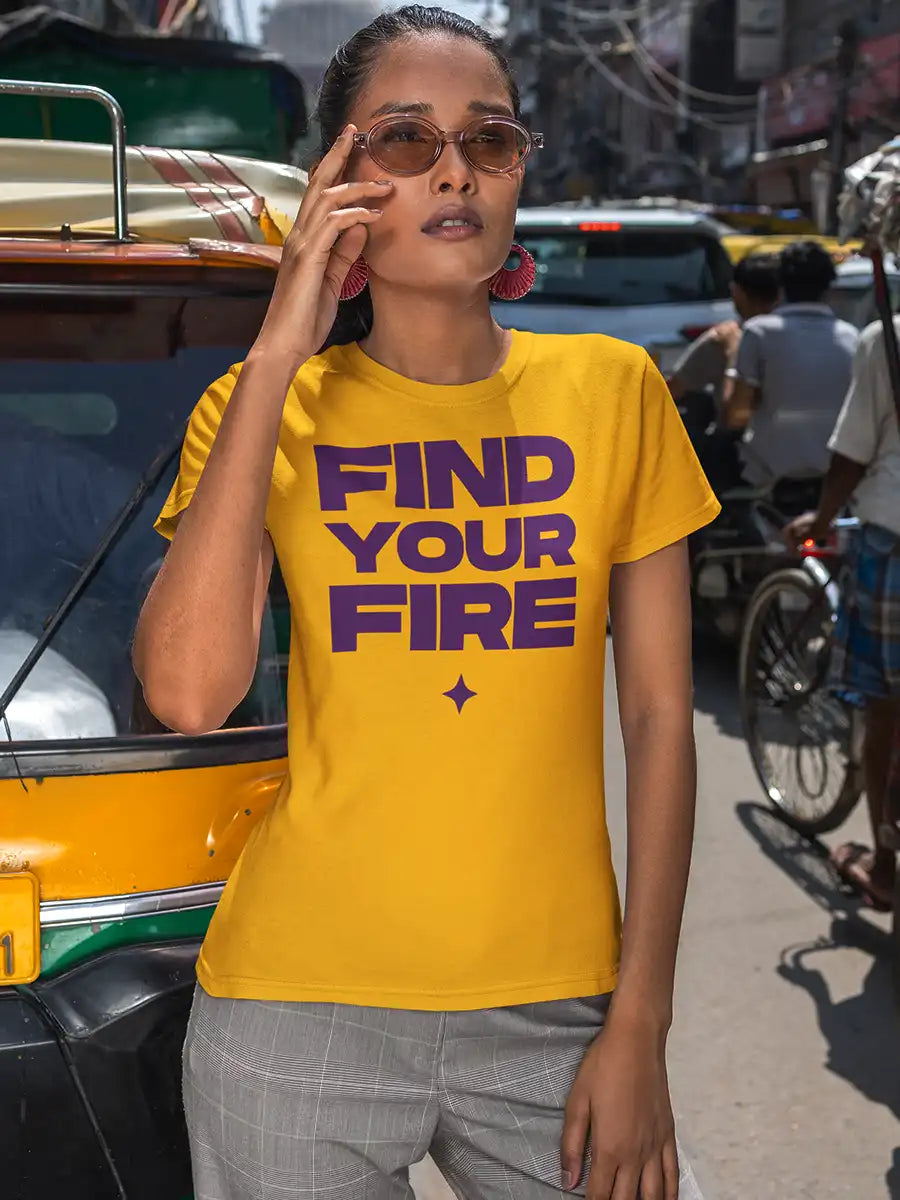 Woman wearing FIND YOUR FIRE- Women's Golden Yellow Cotton T-Shirt 