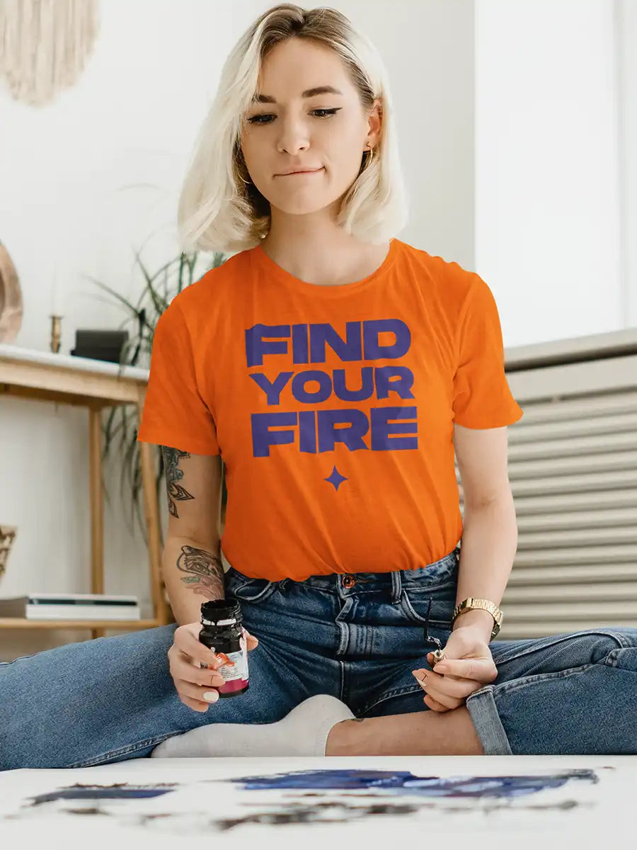 Woman wearing FIND YOUR FIRE- Women's Orange Cotton T-Shirt 