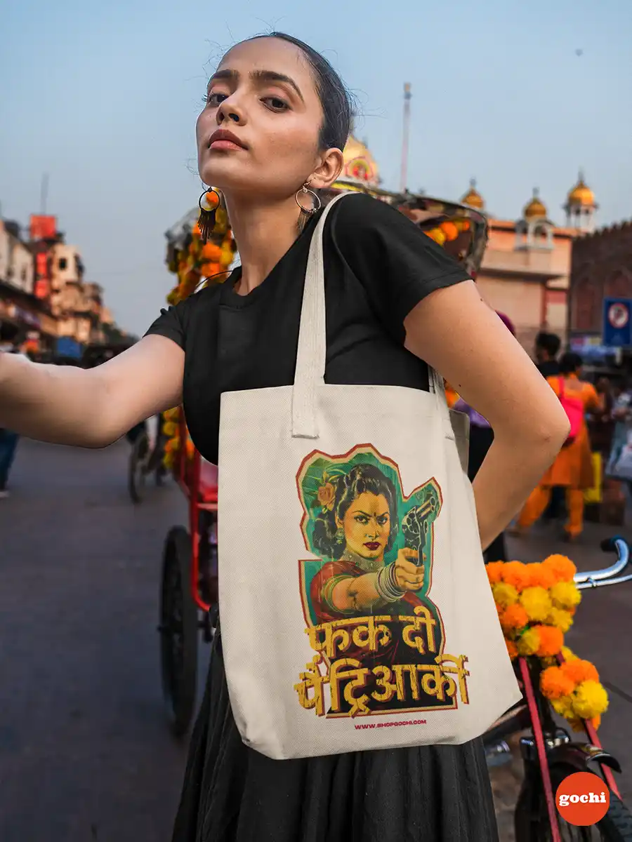 Woman holding Fuck the Patriarchy - Canvas Tote bag