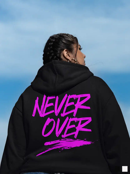 Woman wearing Never Over Black hoodie 