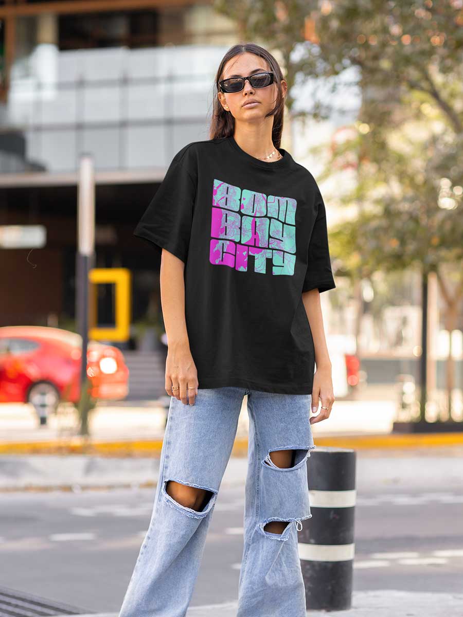 Woman wearing  Black Oversized Cotton Tshirt with Bombay city written on it