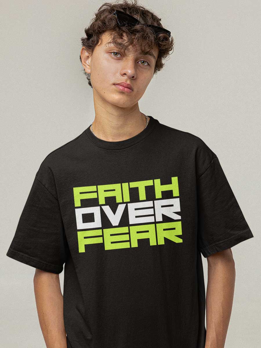 Man wearing Black Oversized Cotton Tshirt with quote "Faith over Fear "