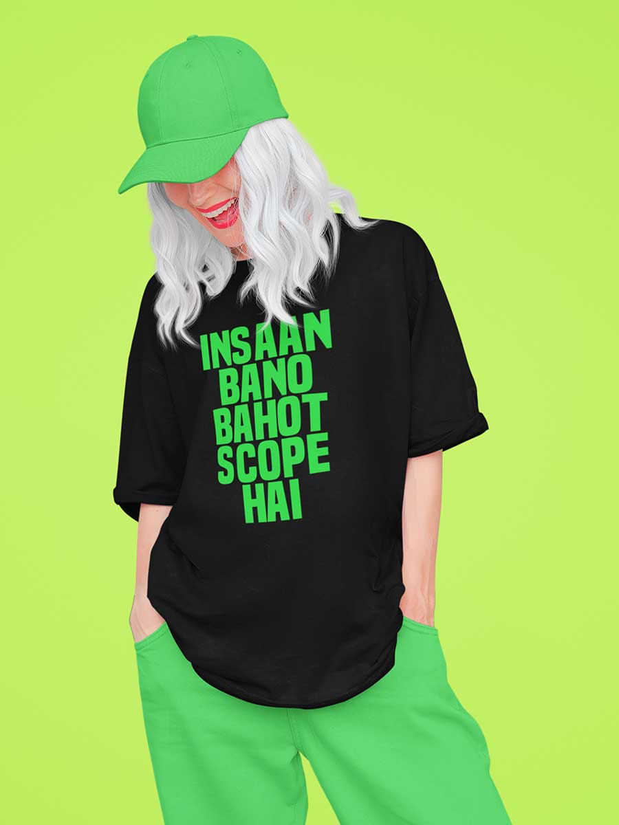 Woman wearing Black Oversized Cotton Tshirt with quote "Insaan bano bahot scope hai"